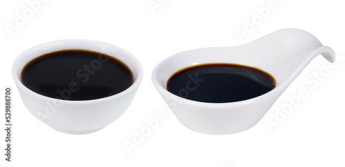 Soy sauce in a white bowl on an isolated white background. Soy sauce collection.