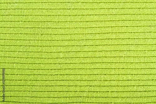 Green Knitted fabric background or texture