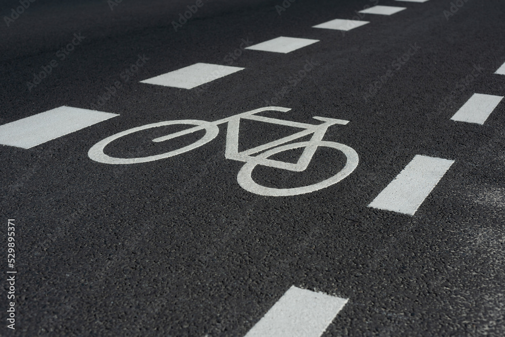Obraz premium bicycle icon road marking on a bike lane