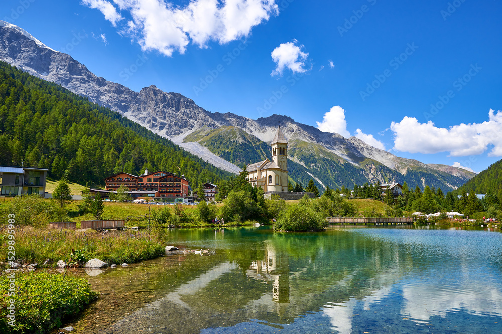 view of the lake of the city of solda, italy