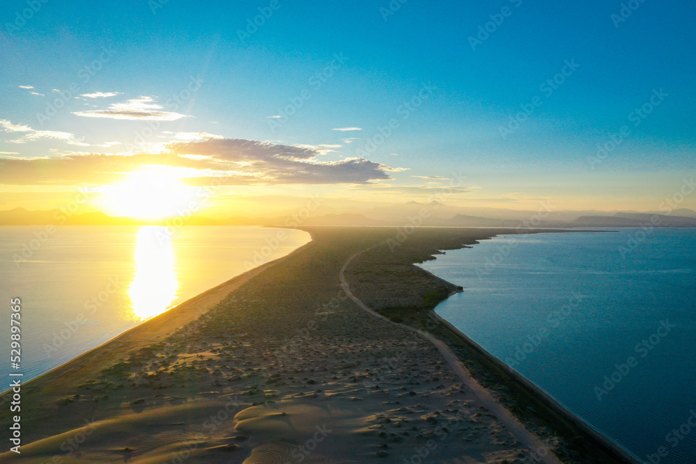 Beautiful sunrise in the dunes of Mogote, aerial view from drone