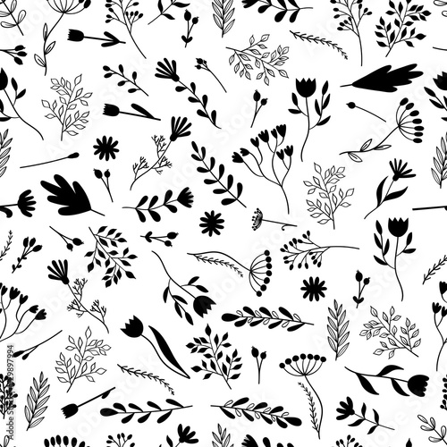 Seamless pattern with hand drawn flowers. Cute floral background. Trendy texture for wrapping, fabric, textile, wallpaper