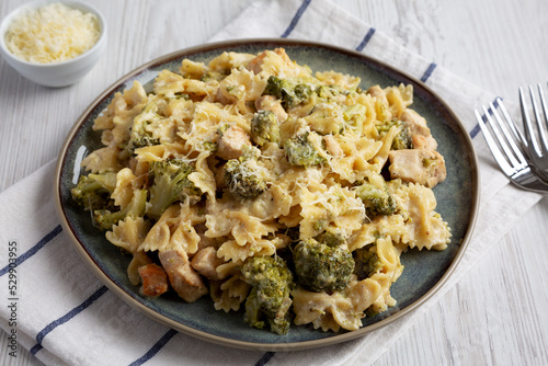 Homemade One-Pot Creamy Chicken and Broccoli Pasta on a Plate, side view.