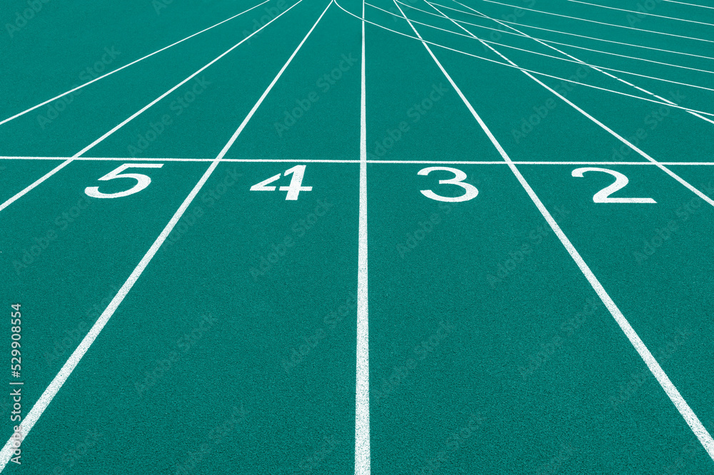 Mint color track and field lanes and numbers. Running lanes at a track
