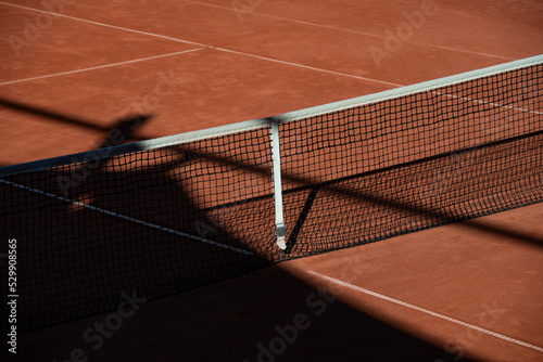 Tennis court net with shadows. Horizontal sport poster, greeting cards, headers, website © Augustas Cetkauskas