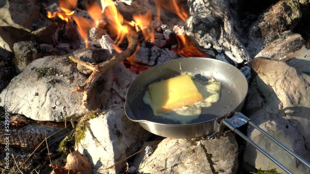 cooking on a campfire in the forest mountain cooking on a campfire in the forest mountain