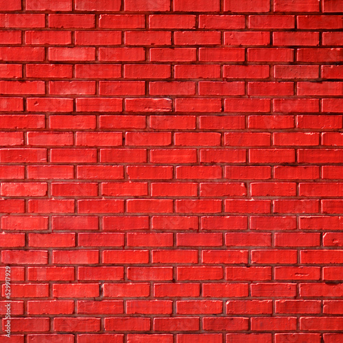 Red brown brick wall abstract background for graphic designers. There are no people or trademarks in the shot.