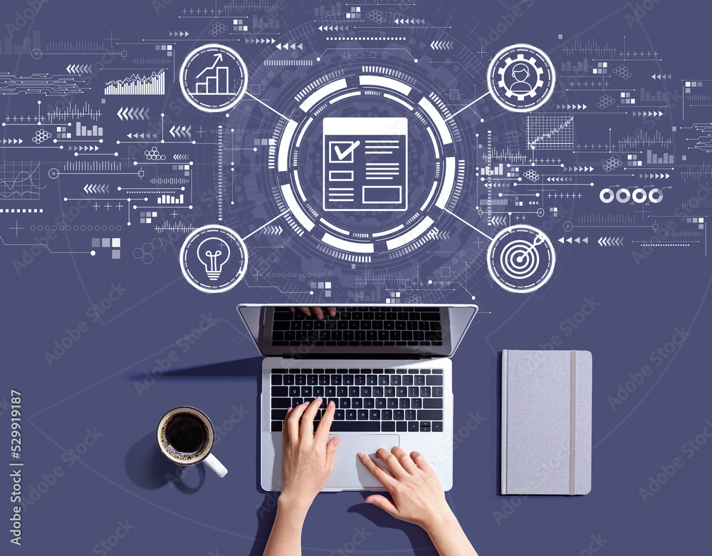 Project management theme with person using a laptop computer Project management theme with person using a laptop computer