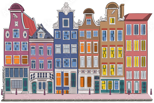 Old traditional colorful stone dutch houses in Amsterdam.