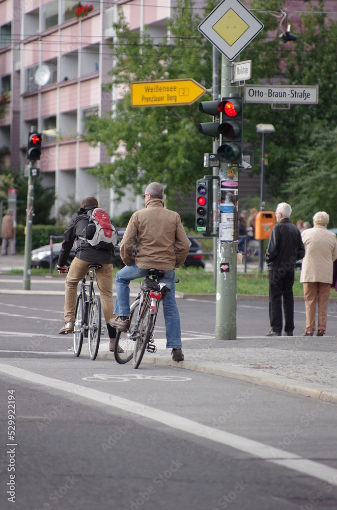 persons on bike in the city