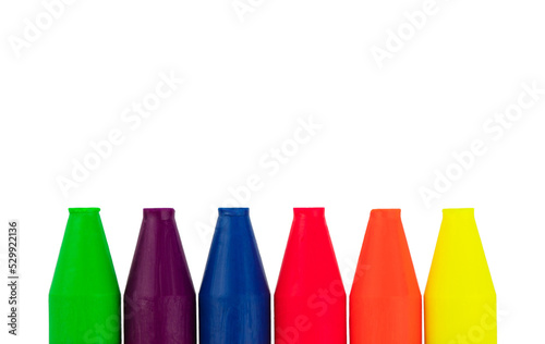 colored wax crayons of 6 colors isolated on a white background