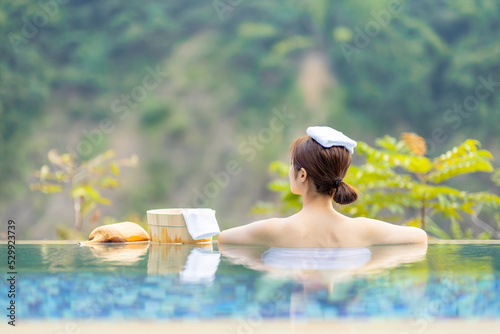 Sit by hot spring pool