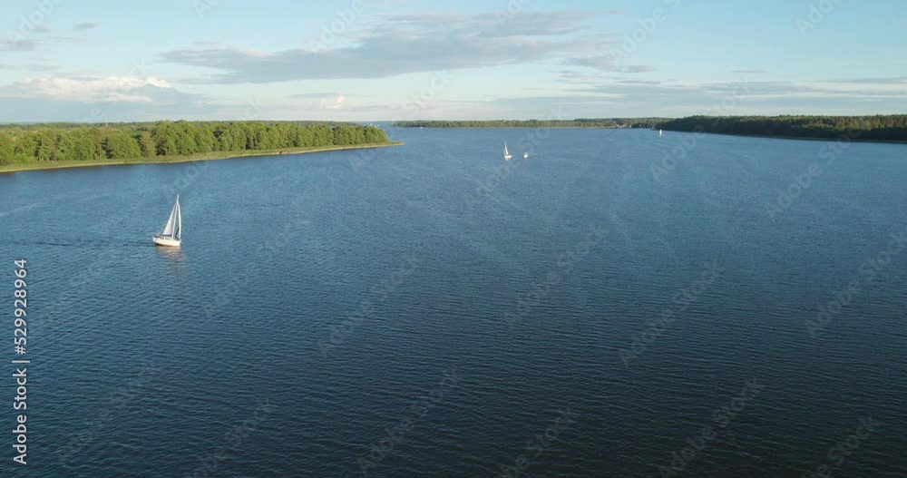 landscape with yachts on the beautiful lake on a summer day (aerial shot) landscape with yachts on the beautiful lake on a summer day (aerial shot)