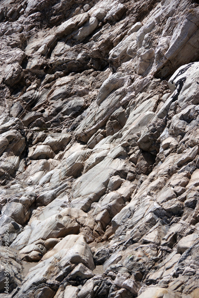 Rocky cliff wall at a California pacific ocean beach in Santa Barbara