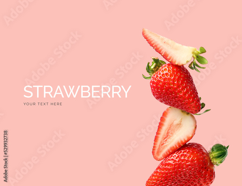 Creative layout made of strawberry on the pink background. Flat lay. Food concept. Macro  concept. 