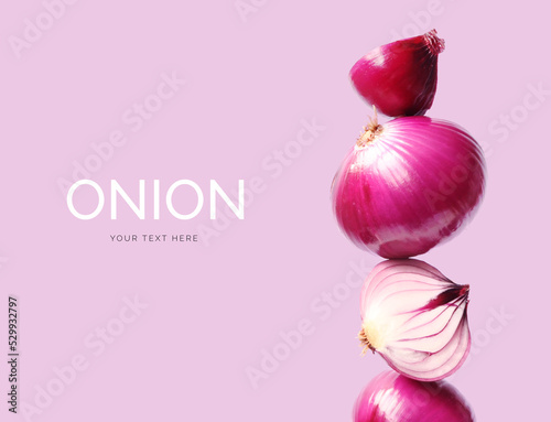 Creative layout made of red onion on the purple background. Flat lay. Food concept. Macro  concept.  photo