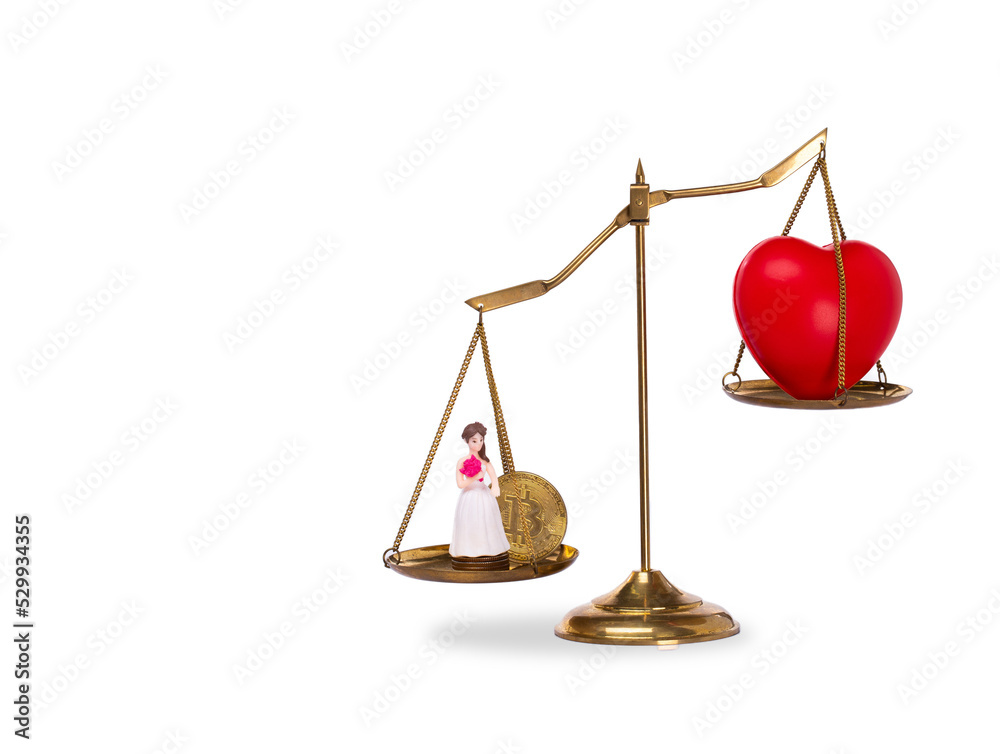 Love Money Symbol Concept. Red Heart shape on balance scale exchange trade for Materialism, bride, bitcoin and buy sale lover. Love for money on balance scale isolated on white background Love Money Symbol Concept. Red Heart shape on balance scale exchange trade for Materialism, bride, bitcoin and buy sale lover. Love for money on balance scale isolated on white background