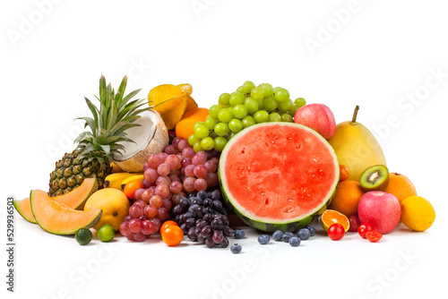 a heap of different fresh fruits on white background.