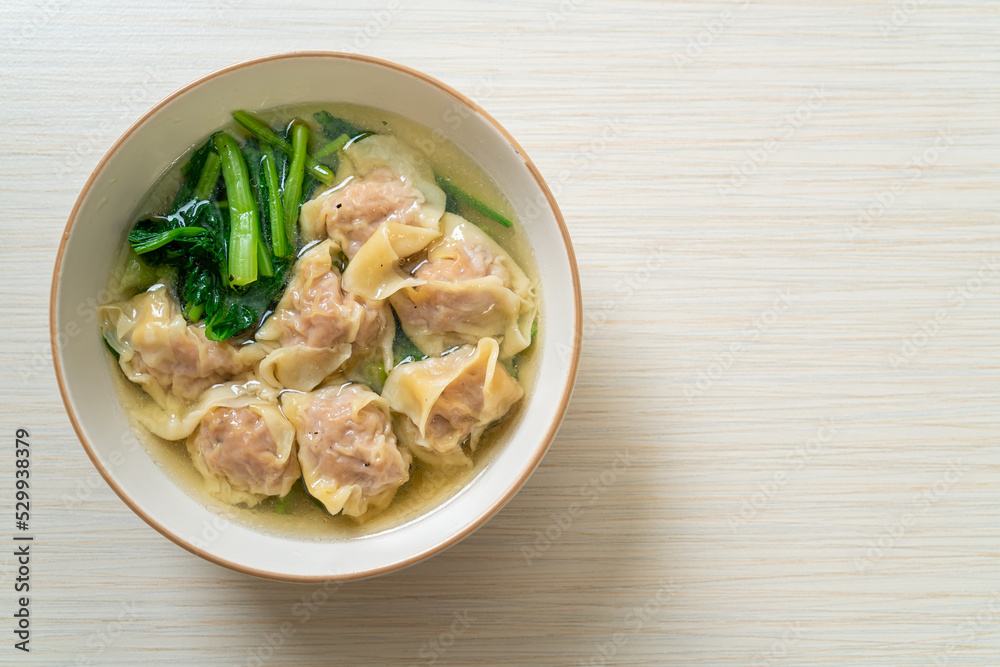 pork wonton soup or pork dumplings soup with vegetable