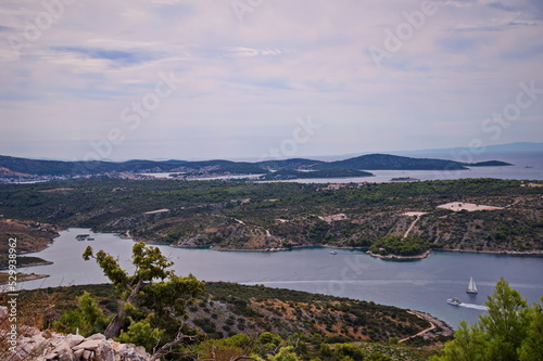 High angle view of a deep bay in Adriatic sea with islands in background