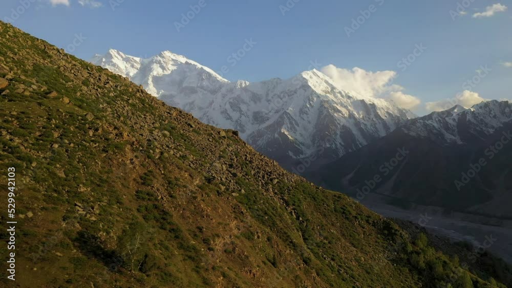 Aerial shot of Nanga Parbat, Fairy Meadows Pakistan, cinematic rotating and revealing drone shot Aerial shot of Nanga Parbat, Fairy Meadows Pakistan, cinematic rotating and revealing drone shot