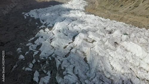 Drone shot over glacier at Fairy Meadows Pakistan, cinematic wide aerial shot photo