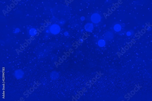 blue fantastic glossy glitter lights defocused bokeh abstract background with sparks fly  holiday mockup texture with blank space for your content