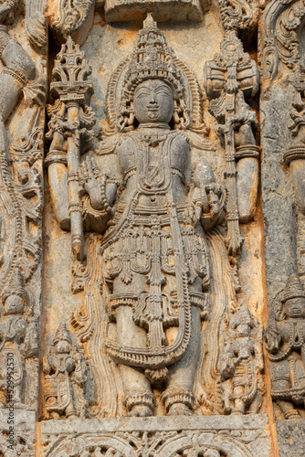 The Sculpture of Hindu God and Goddess on the Hoysaleshwara Temple, Halebeedu, Hassan, Karnataka, India.