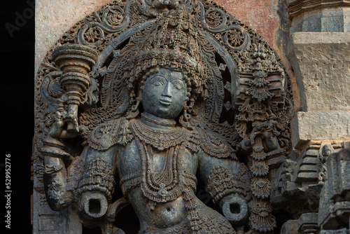 The Sculpture of Doorkeeper of Hoysaleshwara Temple, Beautiful Intricates of Ornaments, Hoysala Temple, Halebeedu, Hassan, Karnataka, India.