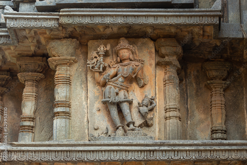 Broken Sculpture of Lord Shiva on the Hoyasaleshwara Temple, Halebeedu, Hassan, Karnataka, India.