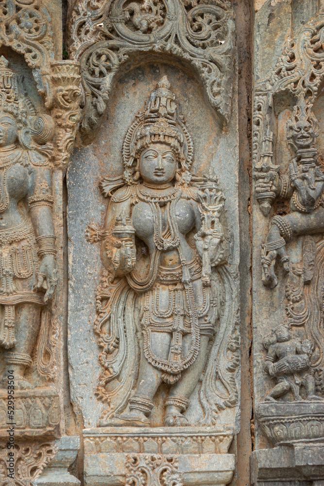 The Carving of Hindu Goddess on the Hoysaleshwara Temple, Halebeedu, Hassan, Karnataka, India.