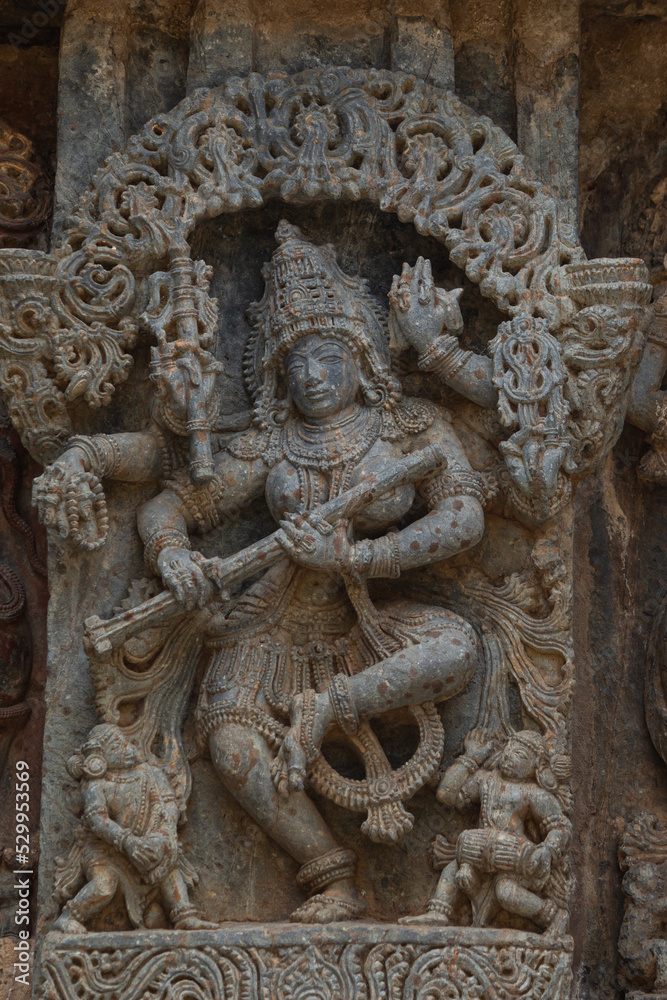 The Carving of Hindu Goddess on the Hoysaleshwara Temple, Halebeedu, Hassan, Karnataka, India.