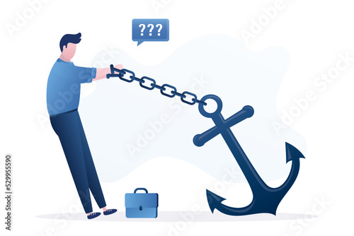 Businessman is chained to a large anchor. Severe insurmountable circumstances hinder business person. Mental problems, credit debt. Business troubles.