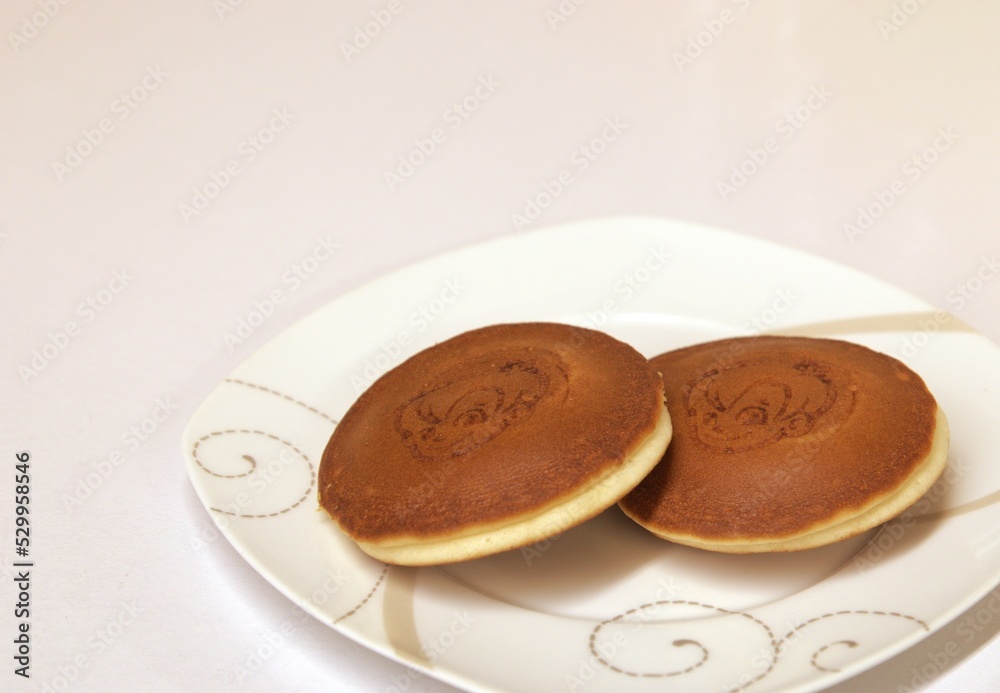 pancakes fried until golden brown on a white plate pancakes fried until golden brown on a white plate