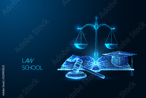 Law school, education concept with open book, gavel, scales and graduation cap on dark blue