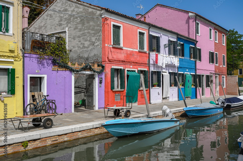 Colorful houses on the canal in Murano island, Venice, 