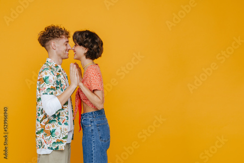 Slika na platnu Young beautiful smiling couple touching witg their noses