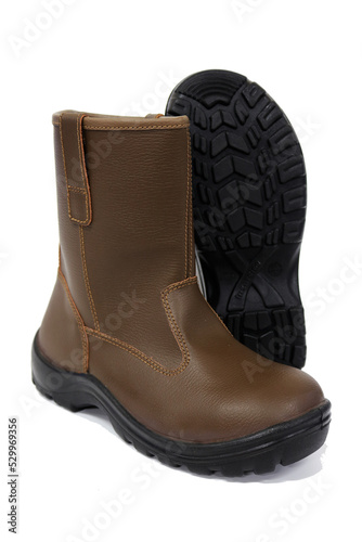 Brown boots for workers to protect their feet when working, these shoes are mandatory safety equipment for construction workers