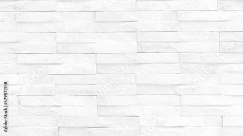 Seamless texture of white brick stone wall a rough surface, with space for text, for a background...