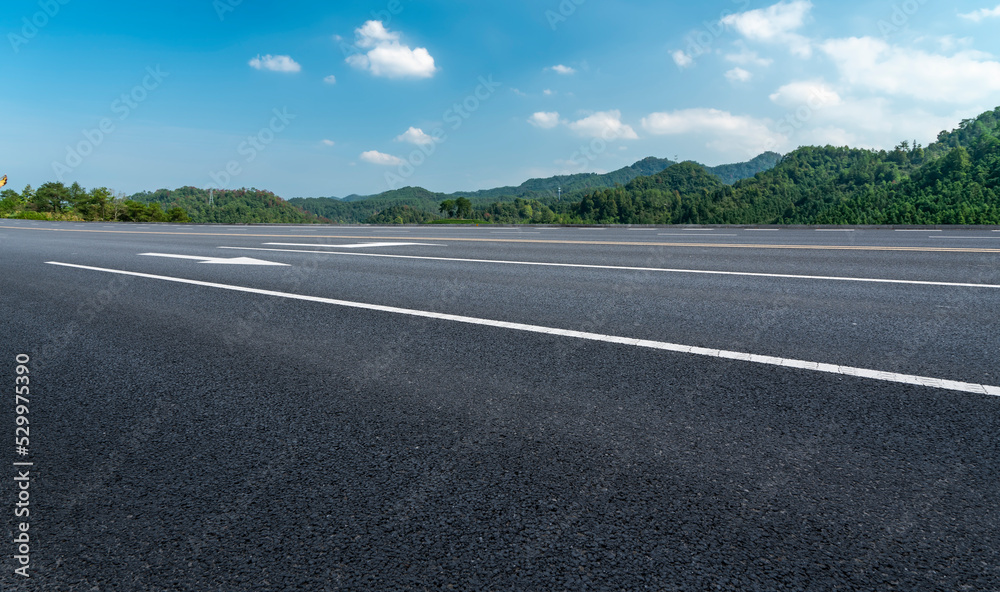 Empty road and city buildings background