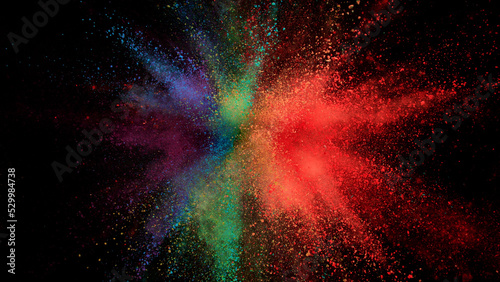 Colored powder explosion isolated on black background. #529984738