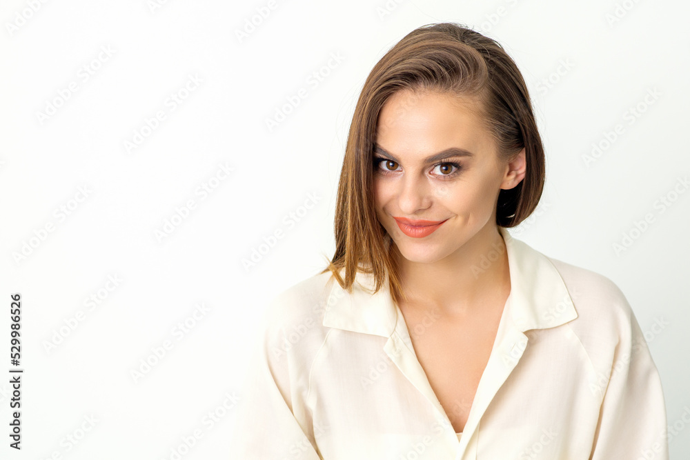 Portrait of a beautiful young caucasian smiling brunette woman with long straight hair standing and looking at the camera on white background Portrait of a beautiful young caucasian smiling brunette woman with long straight hair standing and looking at the camera on white background