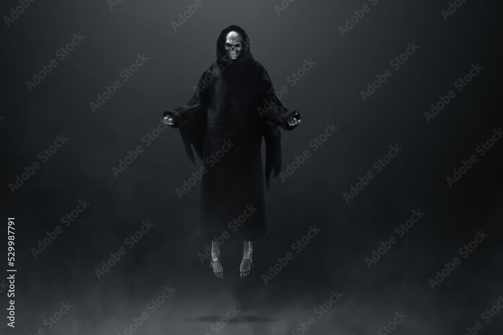 Grim reaper on dark background
