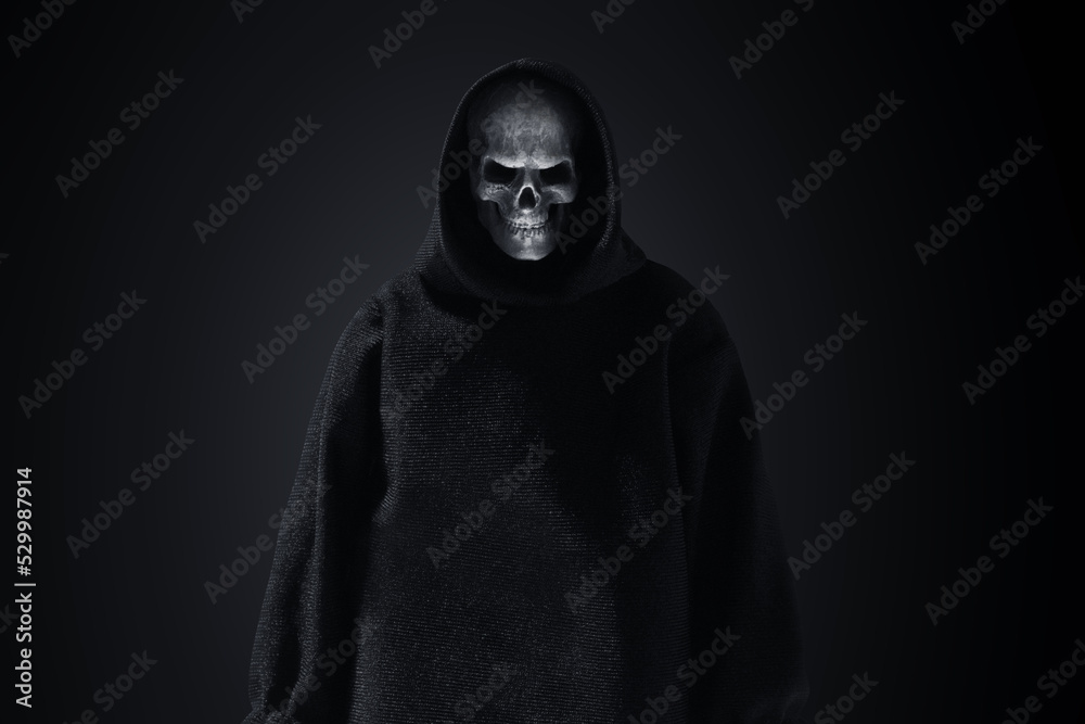 Grim reaper on dark background