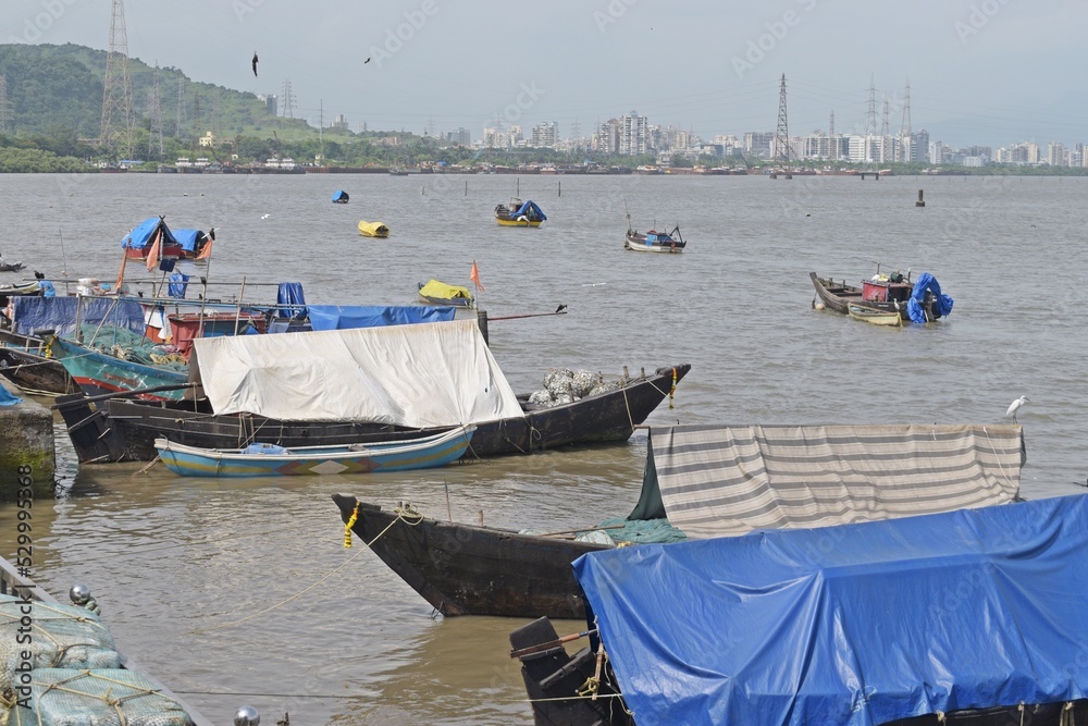 Naklejka premium Traditional wooden fishing boats in the port , mumbai, india