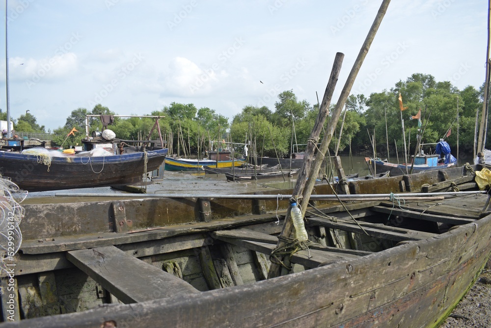 Traditional wooden fishing boats in the port , mumbai, india Traditional wooden fishing boats in the port , mumbai, india