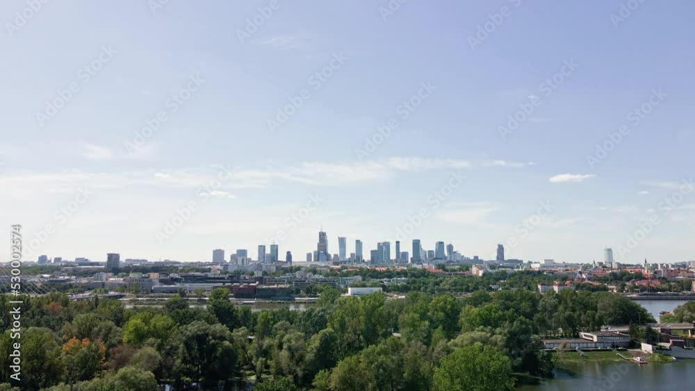 Warsaw aerial view over river and downtown skyline with skyscrapers, Panoramic cityscape of Warshawa city at summer day Warsaw aerial view over river and downtown skyline with skyscrapers, Panoramic cityscape of Warshawa city at summer day
