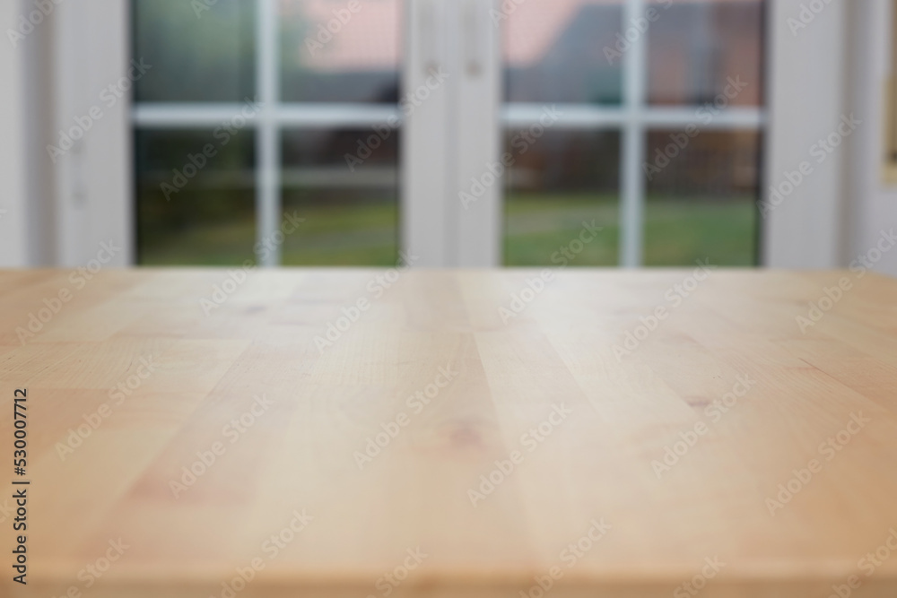 Empty wooden table top with lights bokeh on blur restaurant background. Empty wooden table top with lights bokeh on blur restaurant background.