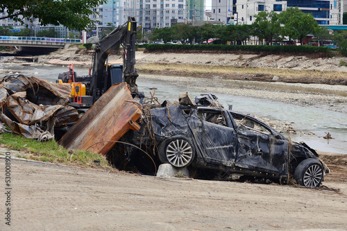 Car was  float down to Naengcheon stream by the typhoon Hinnamnor  in Ocheon-eup, Nam-gu, Pohang-si, Gyeongsangbuk-do, South Korea. photo