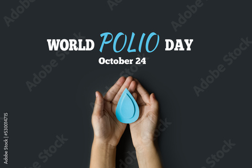 World Polio day. October 24. Blue drop in hands of child is symbol of polio vaccine. Poliomyelitis is disabling and life-threatening disease caused by poliovirus
